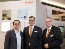 Dr. Berlien visits Radium fair stand